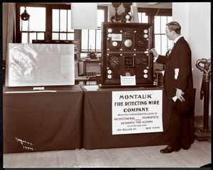 Exhibit of a fire detection system by the Montauk Fire Detecting Wire Co. at the Museum of Safety Appliances of the American Institute of Social Service, New York, 1908 (silver gelatin print)